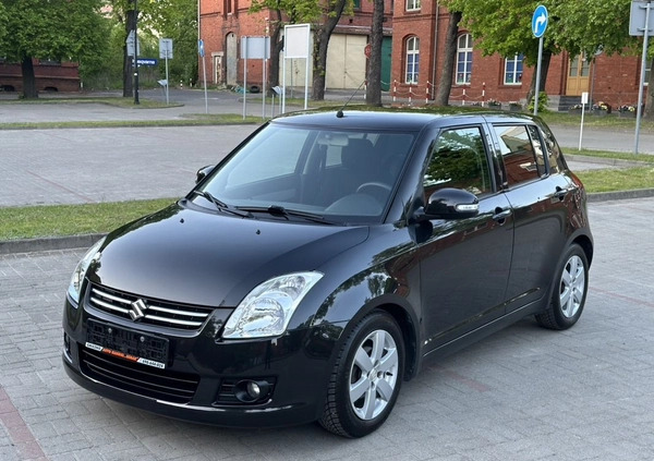 Suzuki Swift cena 16900 przebieg: 121000, rok produkcji 2009 z Gniezno małe 497